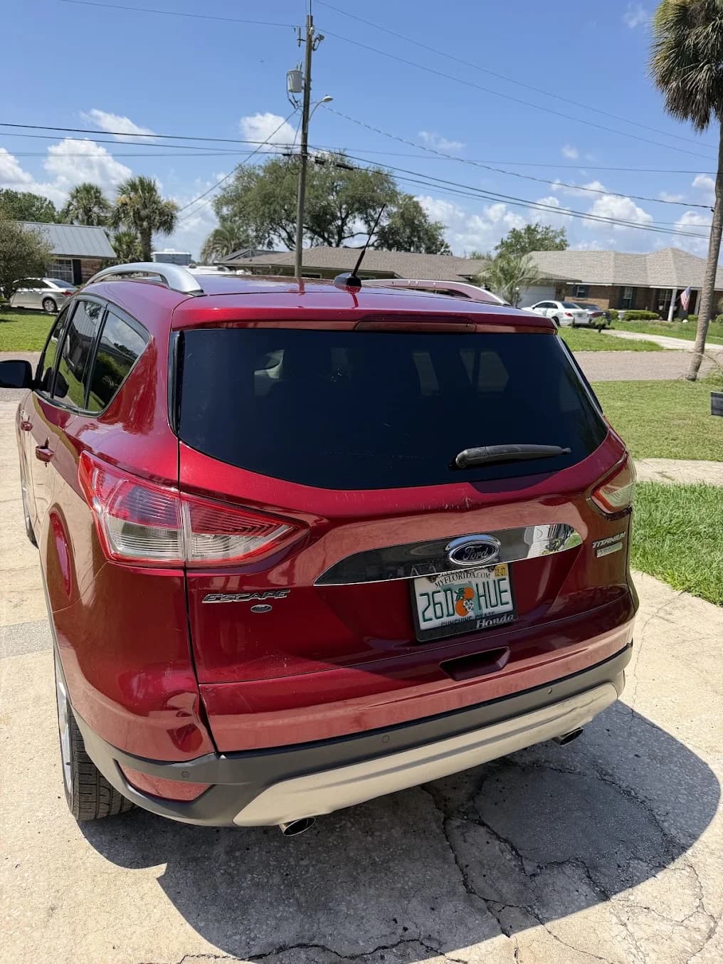 Finished rear auto glass on a Ford SUV